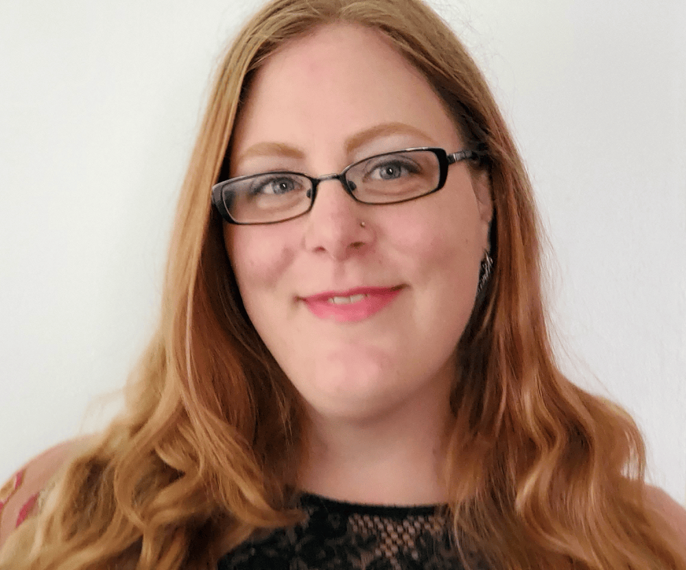 A photograph of a smiling woman